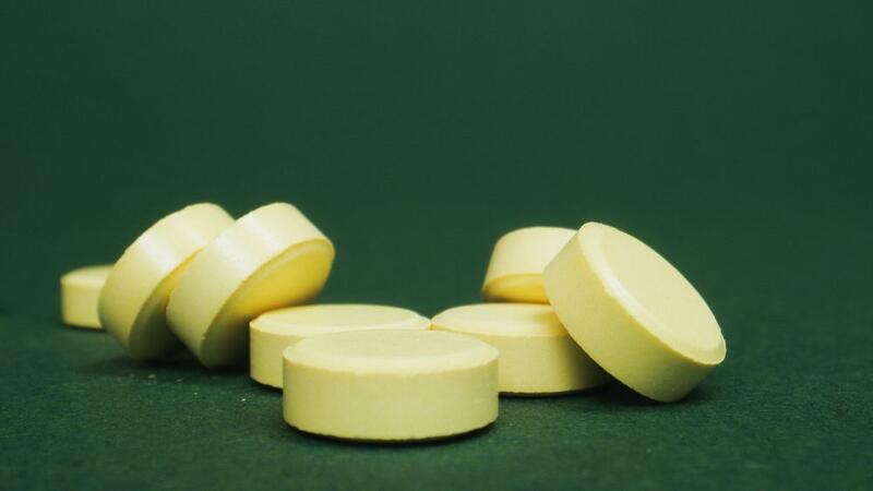 Close-up of yellow tablets