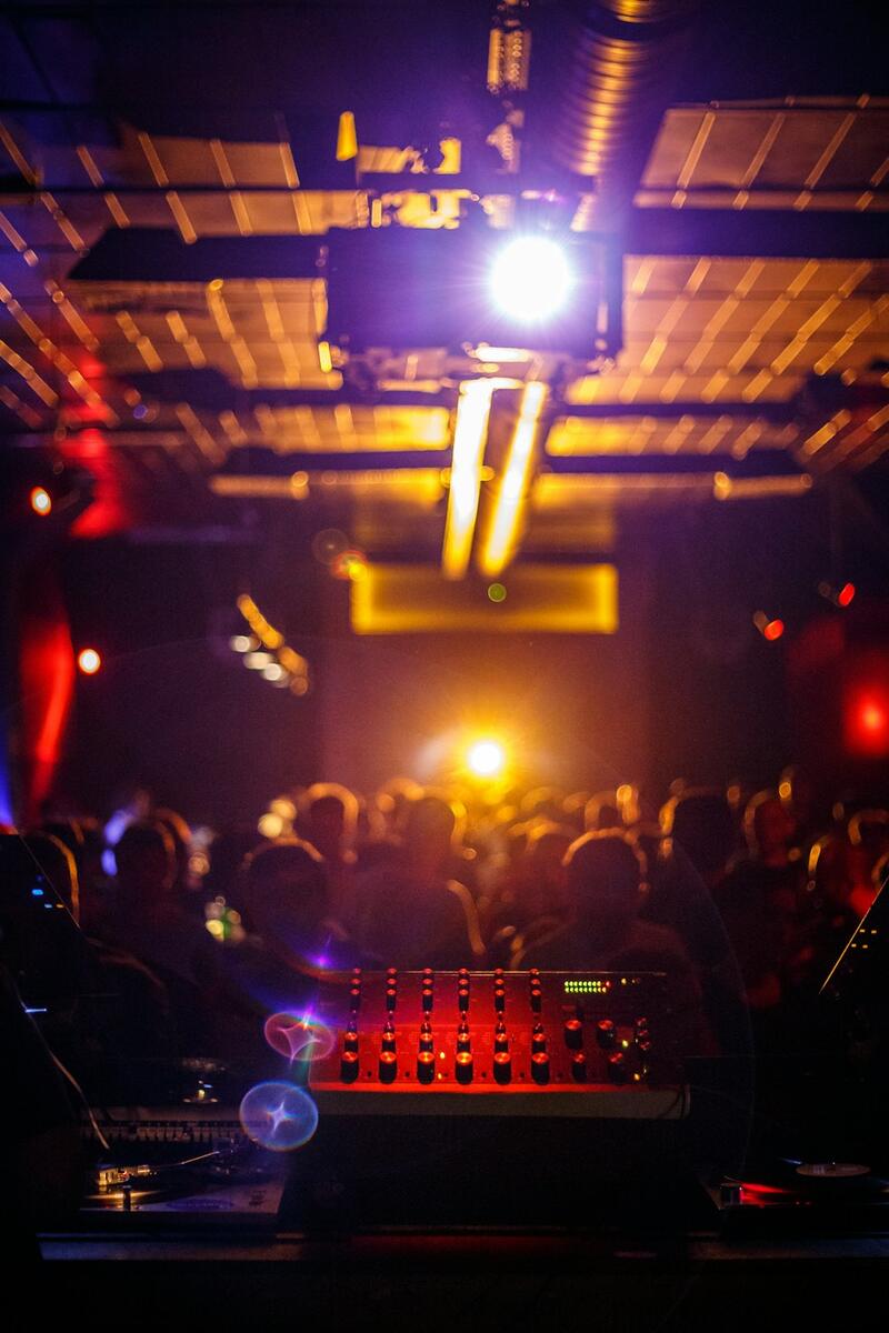 A crowd at a concert at night